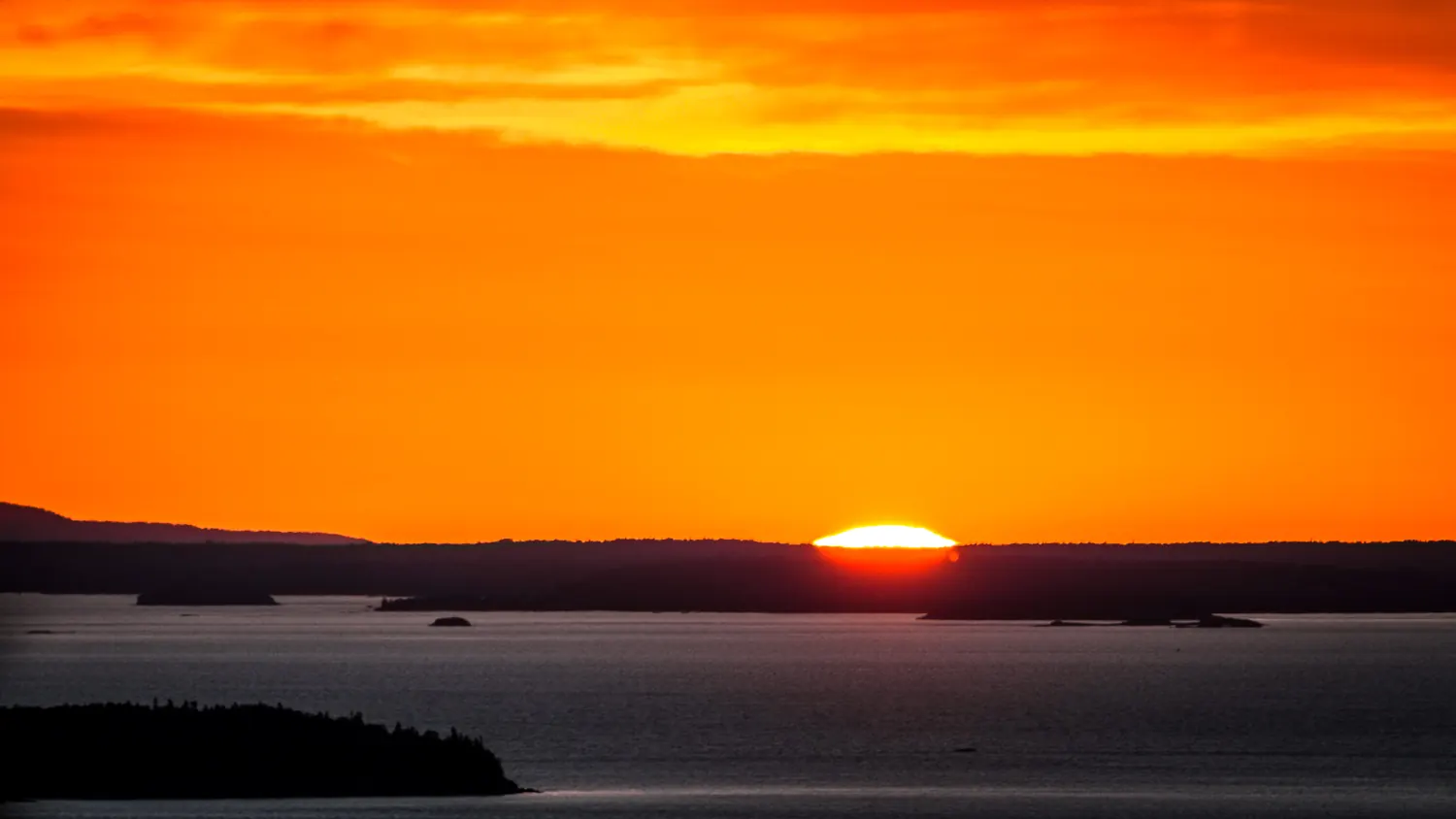 Sunrise over Beech Hill Preserve in Rockport, Maine.