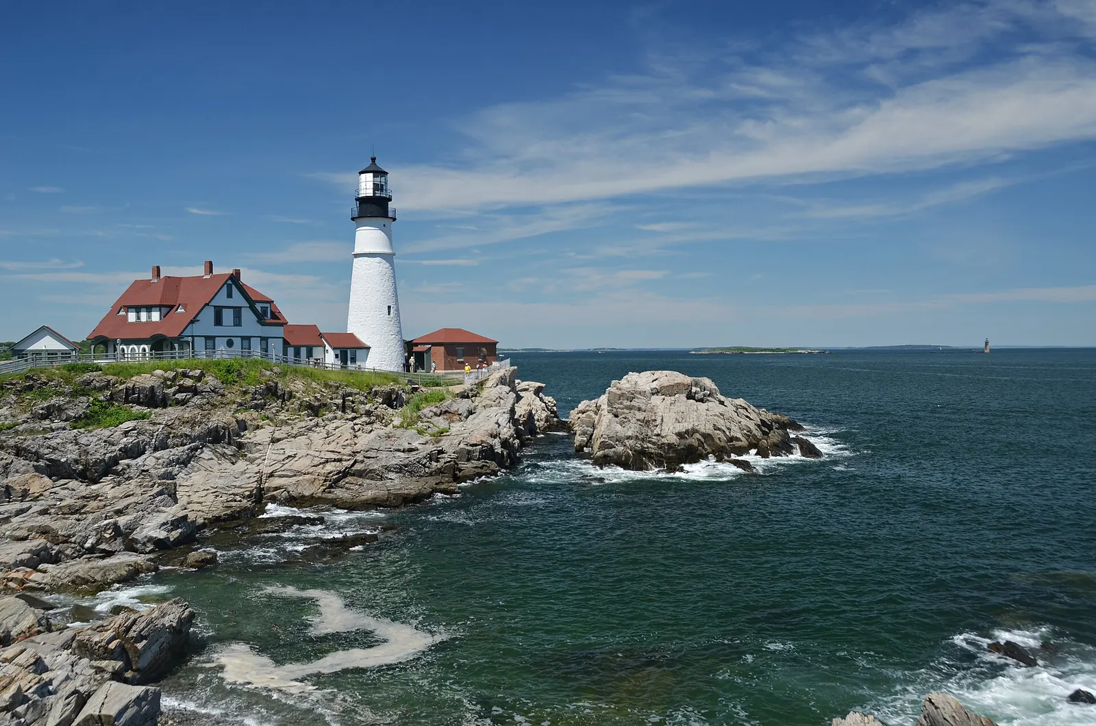 Portland Head Light and the rocky shore at Cape Elizabeth, Maine.